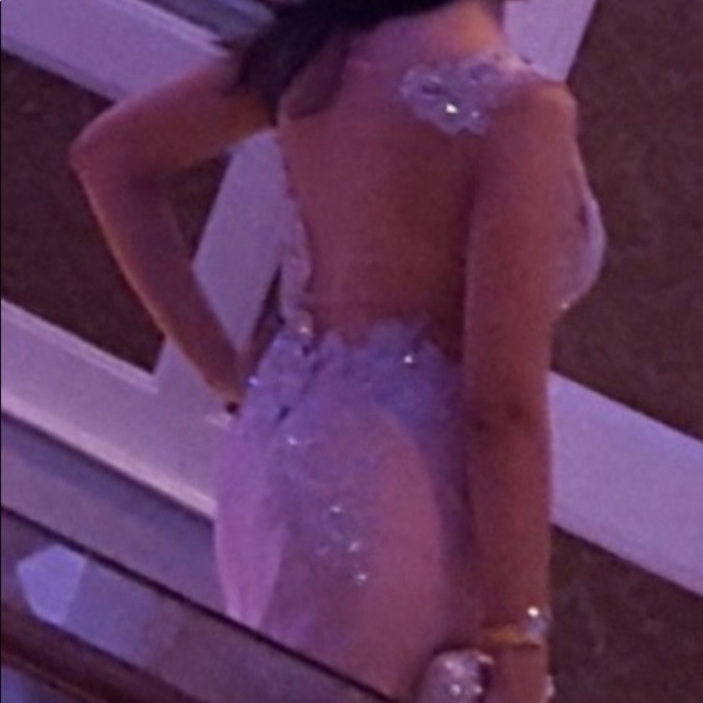 Jovani  sheer illusion gown , front slit. Backless , built in bra . Beaded